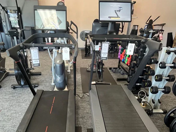 Gym floor with treadmills and exercise bikes