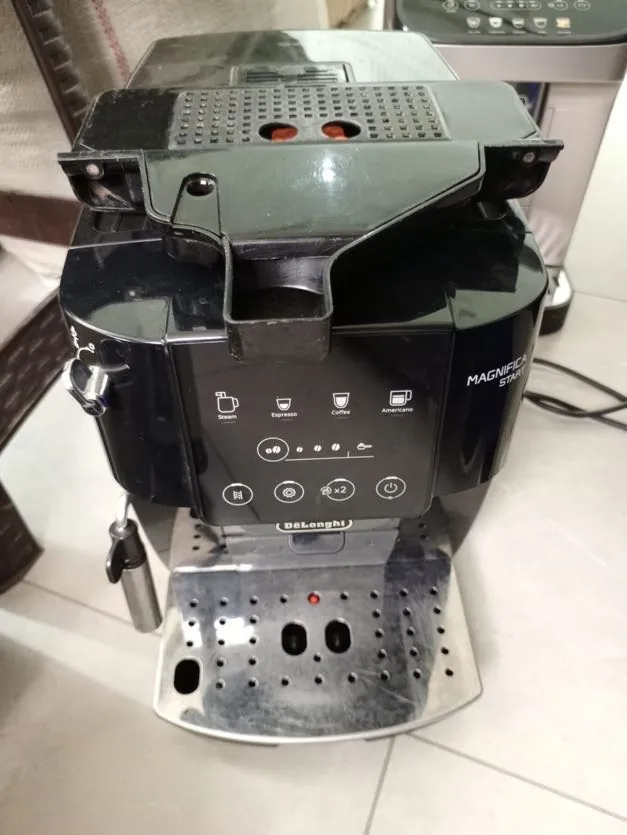 DeLonghi bean-to-cup coffee machine in for service