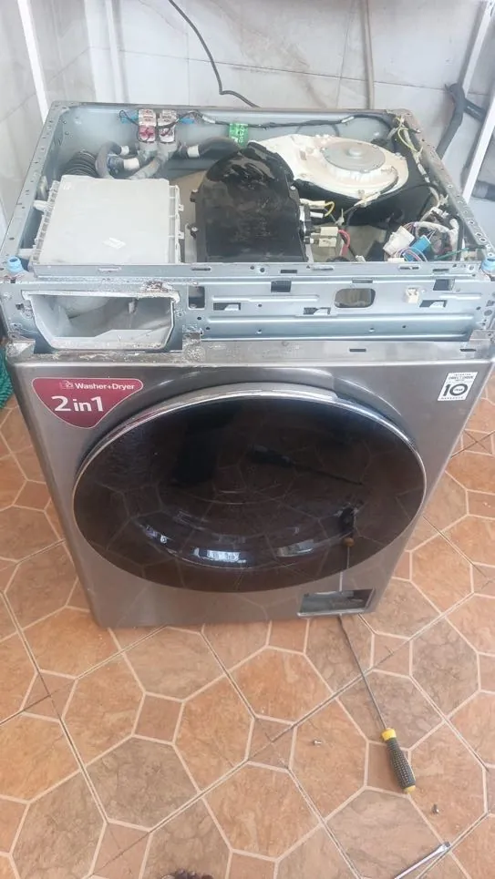 LG 2-in-1 washer-dryer with the top removed