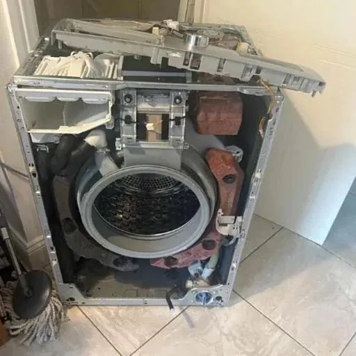 Washing machine with the cabinet opened to the drum