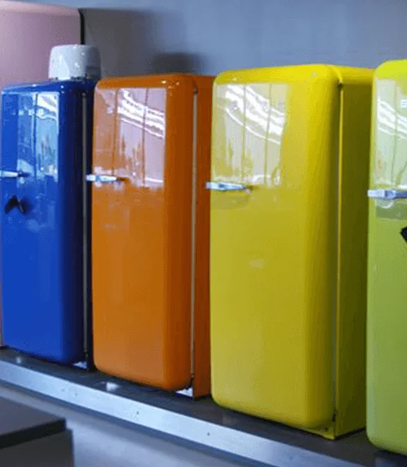 Colourful retro-style fridges in a row